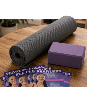 Pink rolled yoga mat beside blue storage box on purple gradient background