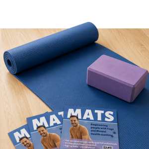 Rolled yoga mat with cork block on blue background, representing wellness and fitness programs